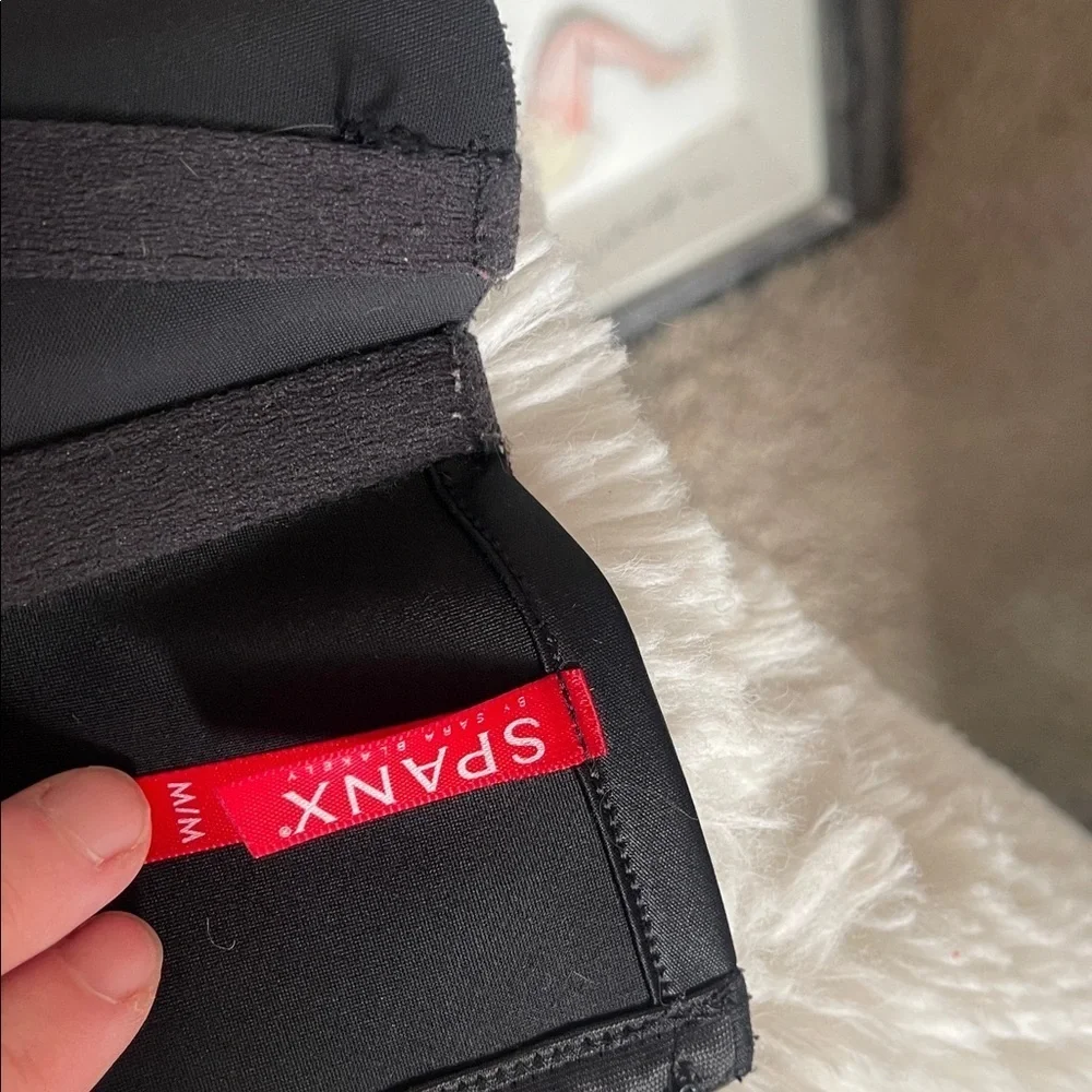 SPANX Black Waist Trainer with Red Tag there are 4 but all got some  issues